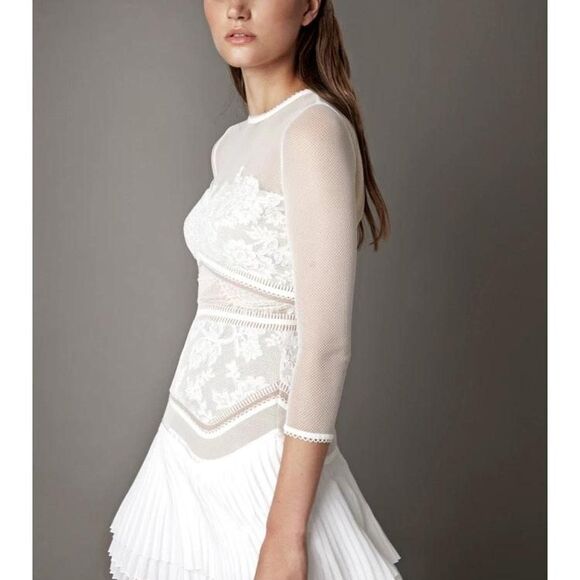 Dresses & Skirts - NWT Three Floor White lace mini dress with mesh sleeves